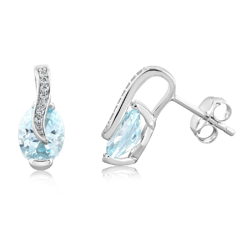 Luxury Handcrafted Jewelry For Elegant Looks Sterling Silver Rhodium Plated Light Blue And White CZ Crossover Stud Earrings